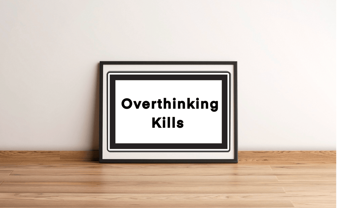 Add a touch of modern flair to your space with the "Overthinking Kills" art print! This striking piece, with its simple black border, rests elegantly against a crisp white wall on a cozy wooden floor. The bold black text stands out beautifully, serving as both a stylish decor element and a thoughtful reminder to seek mental clarity. Perfect for minimalist enthusiasts who love combining artistry with meaningful messages!