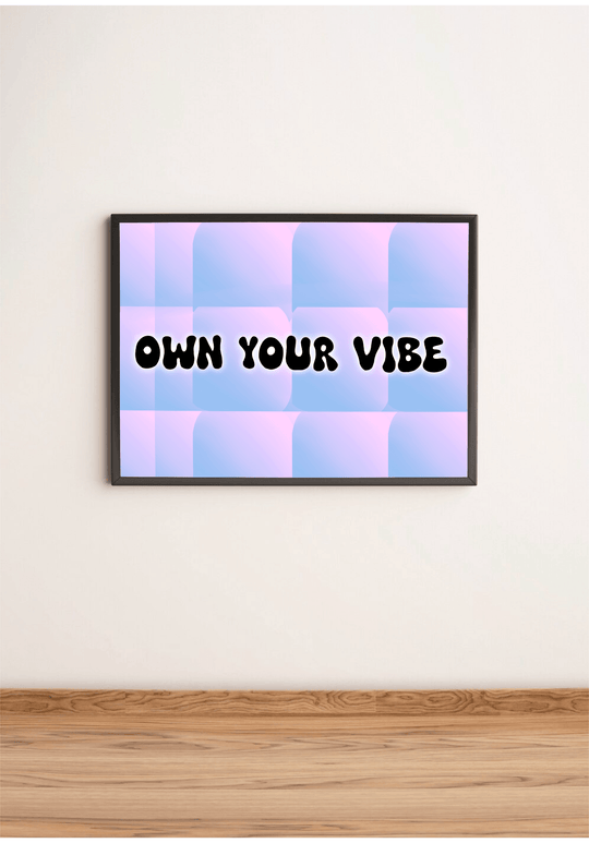 Meet your new favorite piece of décor: a stunning "Own Your Vibe Print" that’s sure to brighten up any space! Resting elegantly on a wooden floor and leaning comfortably against a simple wall, this framed print showcases its high-gloss finish with flair. The bold, black typography shouts "OWN YOUR VIBE" across a playful checkered canvas of pastel pink and blue. This vibrant piece isn’t just art; it’s an invitation to embrace your unique energy every day. Perfect for adding personality to your room or office