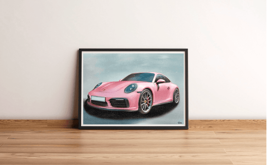 Introducing the stunning Framed Pink Porsche Print! This eye-catching piece showcases an incredibly realistic and glamorous pink Porsche, perfectly styled to capture everyone's attention. The art is thoughtfully displayed on a wooden floor with a lovely light-colored wall as its backdrop, adding a touch of elegance and charm to any space. You'll love how the car is angled slightly to the left, highlighting its sleek design, silver rims, and that soft shadow underneath—it's pure automotive artistry! The back