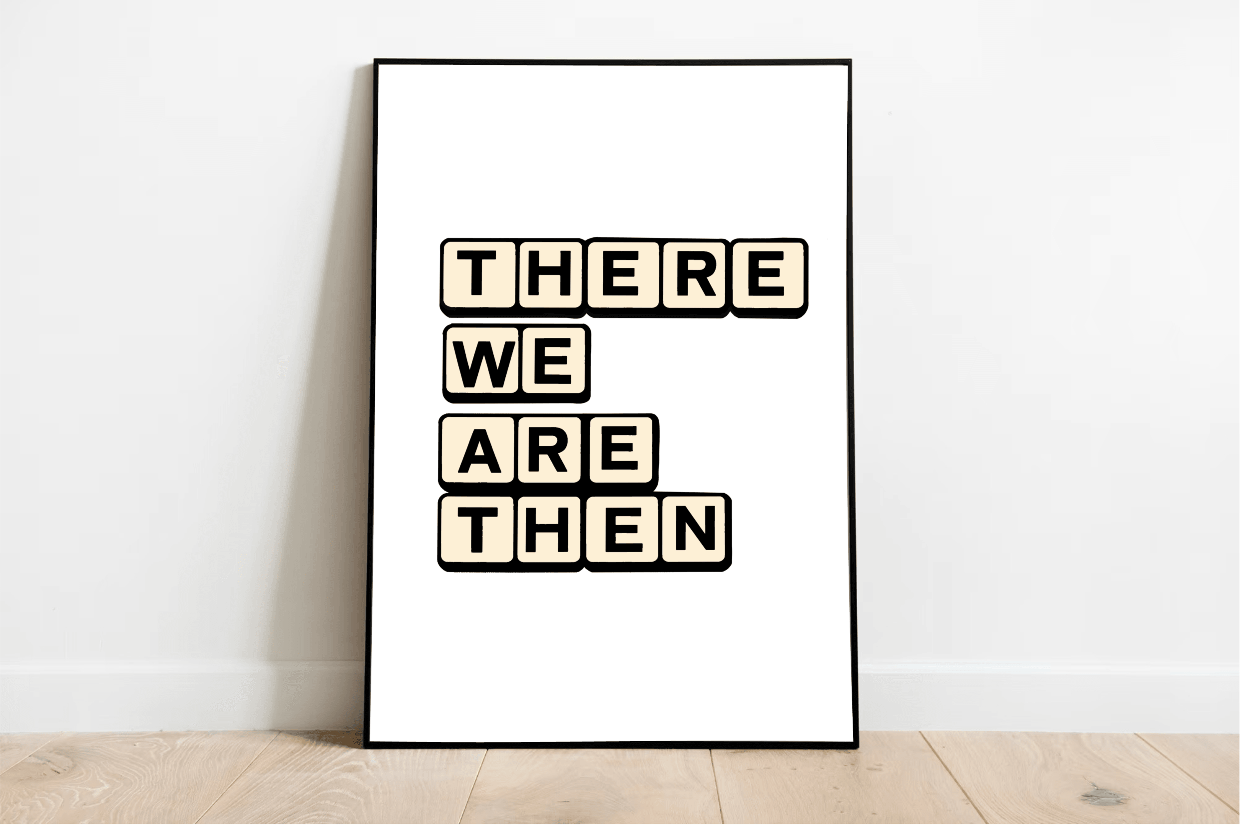 Add a touch of playful charm to your room with our vertical framed "There We Are Then Twat Print" poster! Resting stylishly against a crisp white wall on a warm wooden floor, this delightful Scrabble art piece is sure to make any space feel more inviting. The bold black uppercase letters spell out "THERE WE ARE THEN" on a soft cream background, cleverly arranged like Scrabble tiles for that perfect blend of fun and sophistication.