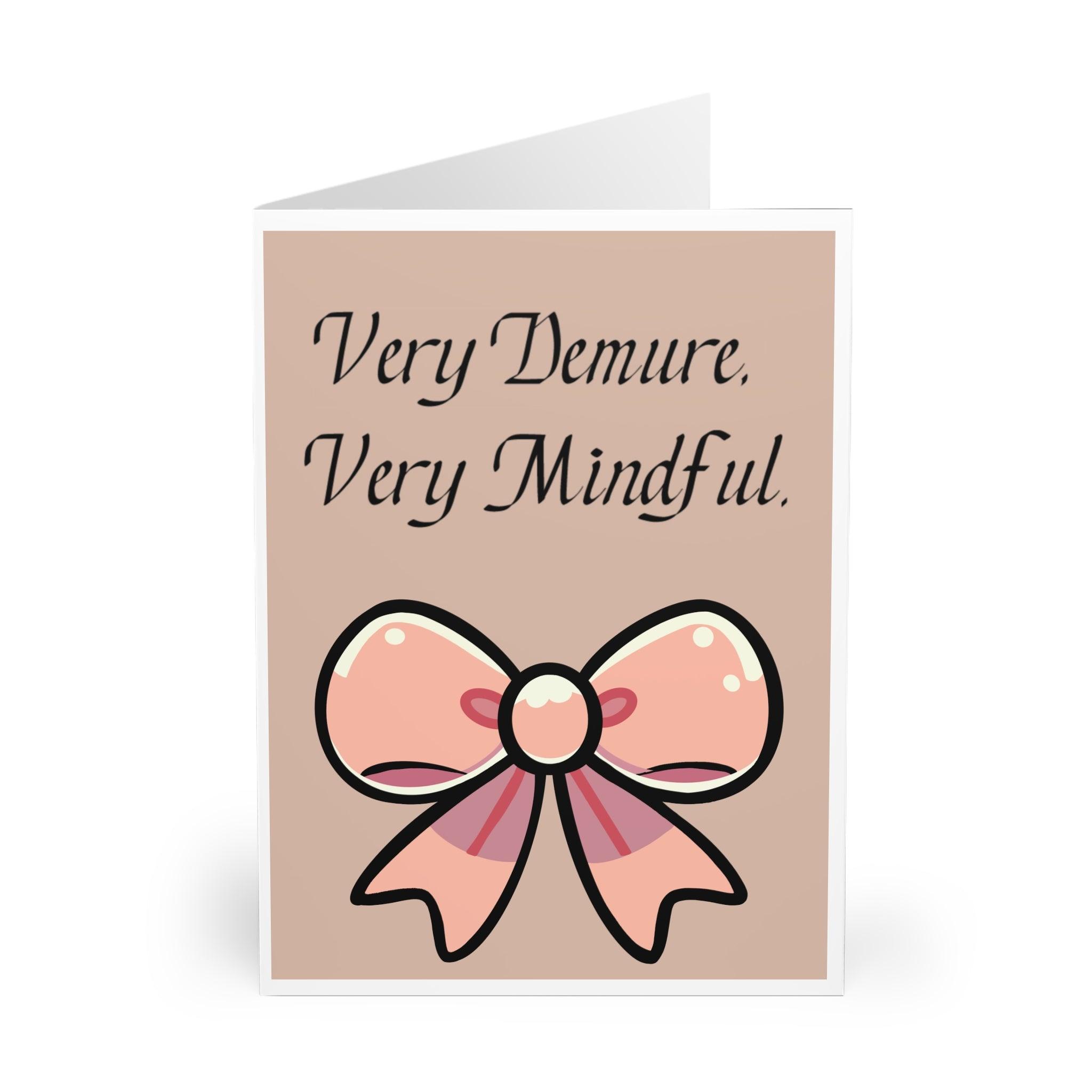 Charming card with a pink bow illustration and the phrase 'Very Demure, Very Mindful.' A cute and whimsical card for someone who appreciates elegance - Baby Keo