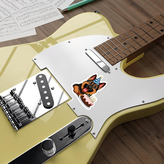 A cute waterproof sticker featuring a German Shepherd dog wearing a party hat and a birthday cake. Great for dog lovers - Baby Keo.