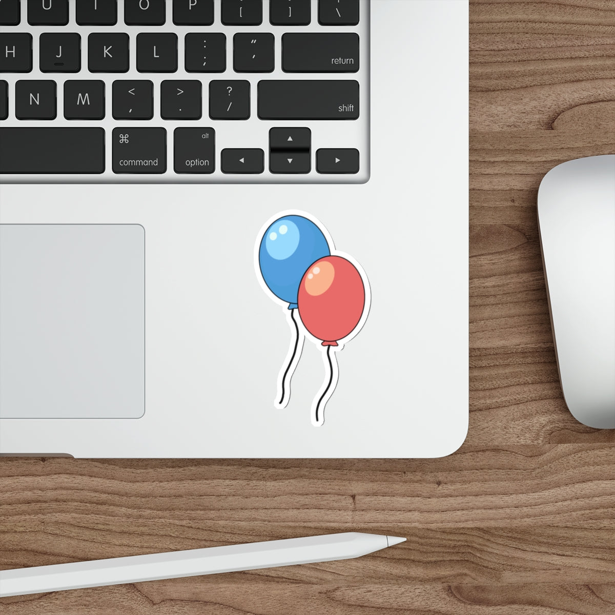 A fun and festive sticker featuring a red and blue balloon, perfect for celebrating special occasions or adding a pop of color to your devices. Waterproof and durable. KEOLIX 