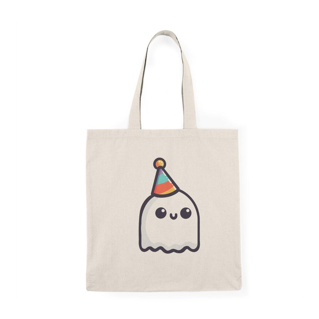 A cream-colored tote bag featuring a playful illustration of a cute ghost wearing a party hat, surrounded by colorful confetti. The text 'Party Ghost' adds a fun and festive touch, perfect for celebrating any occasion or Halloween