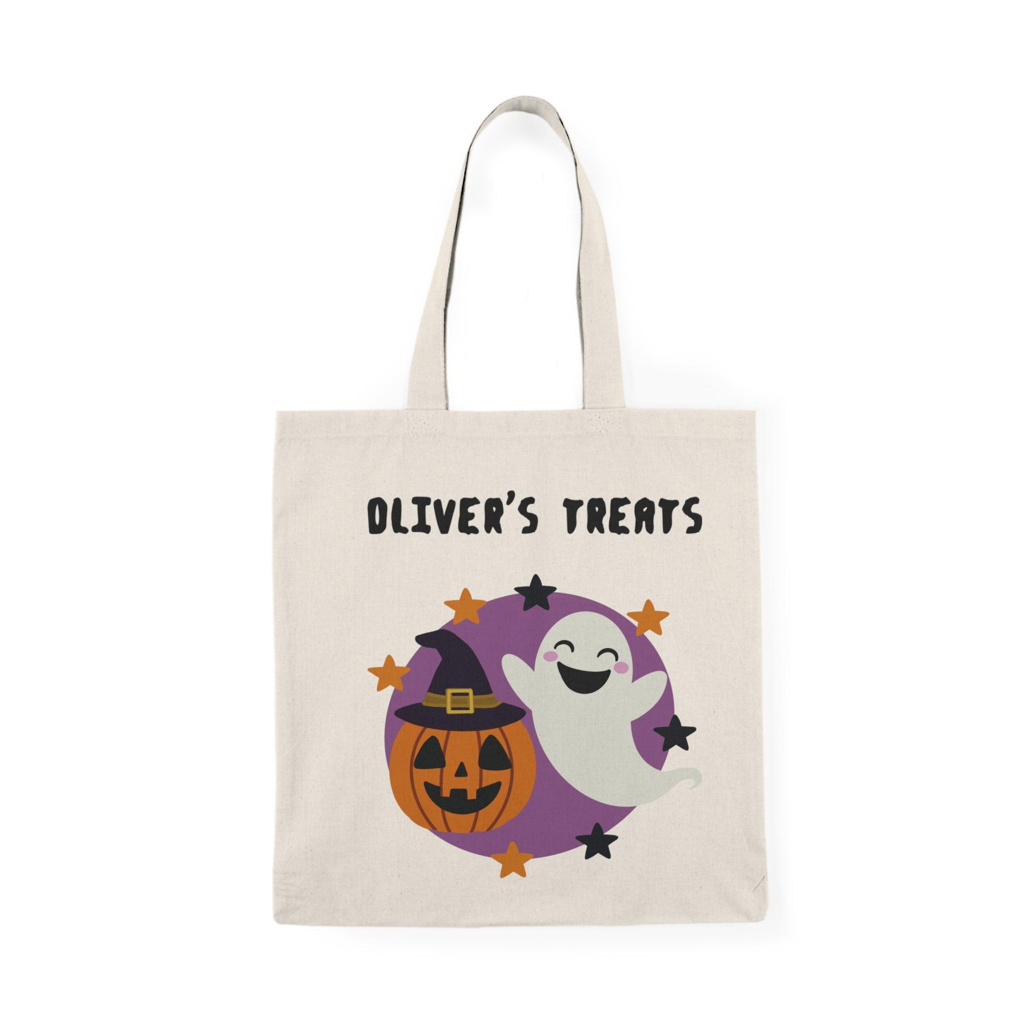 A natural tote bag displaying a whimsical design featuring a friendly ghost and Halloween elements, along with the text 'Oliver’s Treats.' This playful design is perfect for Halloween festivities, making it a fun accessory for trick-or-treating or festive gatherings