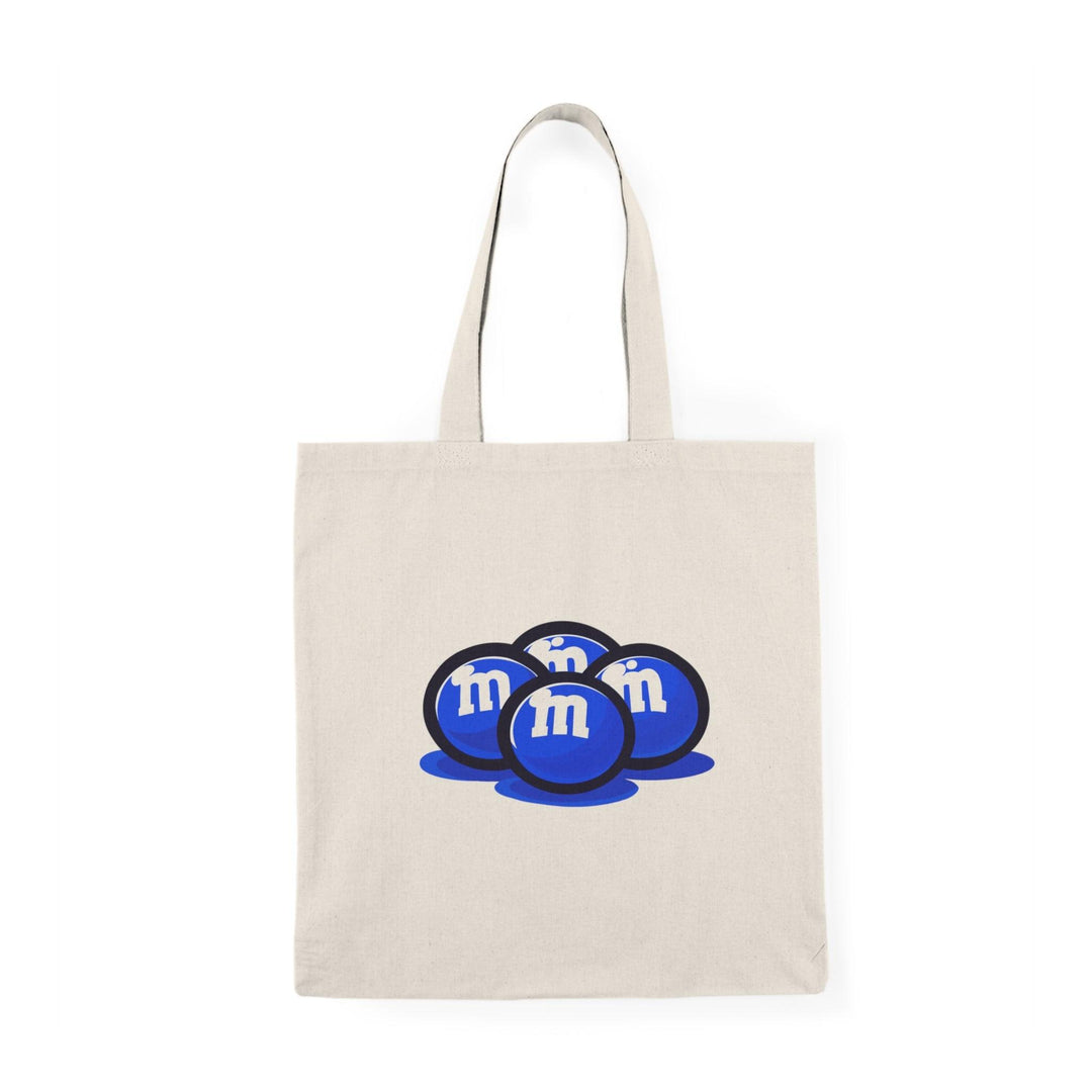 Fun and playful canvas tote bag featuring the classic M&M’s candy logo in bright colors. Perfect for casual outings, shopping trips, or as a gift for candy lovers. Durable and eco-friendly - Baby Keo