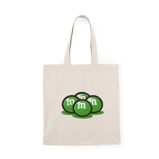 Fun and playful canvas tote bag featuring the classic M&M’s candy logo in bright colors. Perfect for casual outings, shopping trips, or as a gift for candy lovers. Durable and eco-friendly - Baby Keo