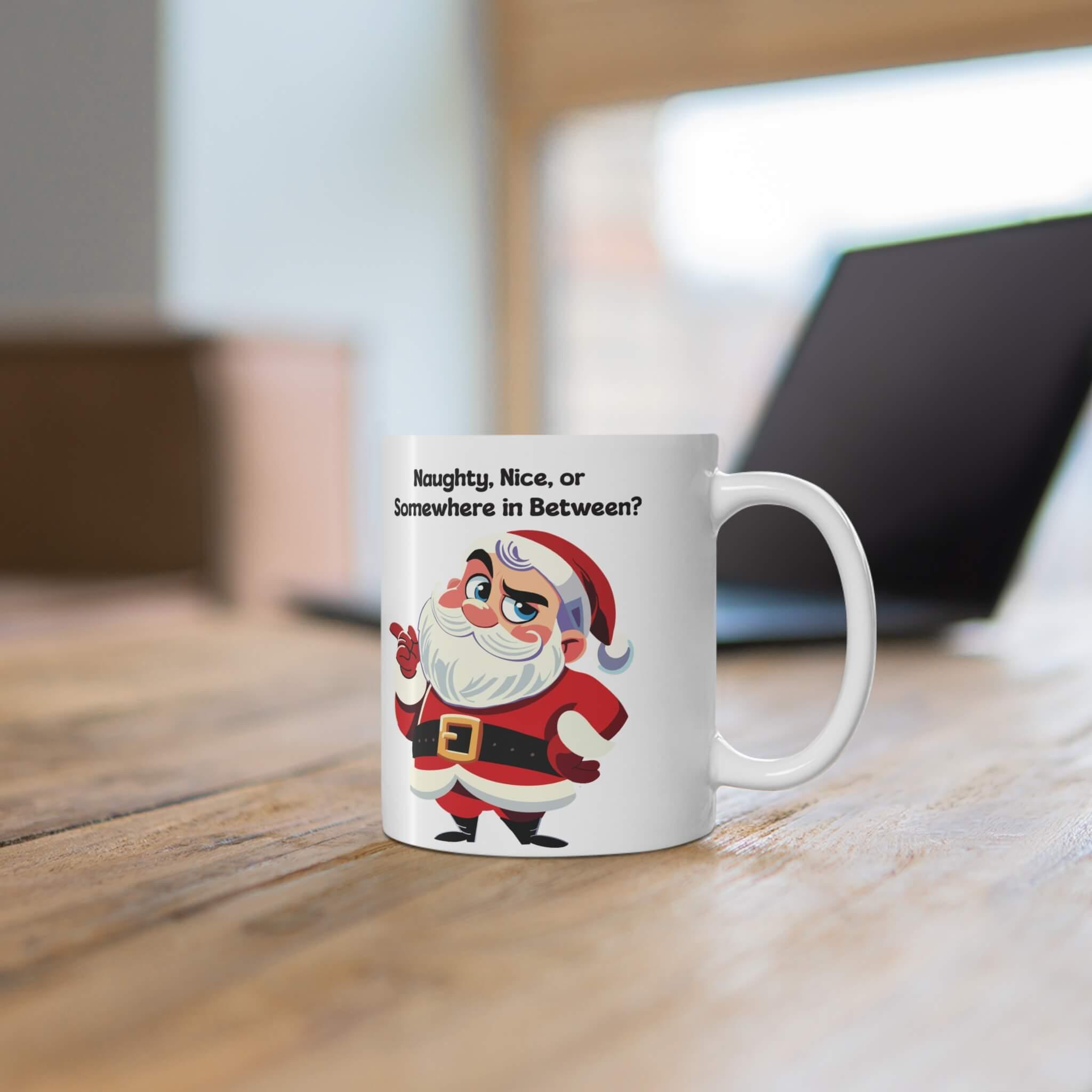 Funny Christmas mug featuring a sassy Santa and the phrase 'Naughty, Nice, or Somewhere in Between?' Perfect for holiday coffee or hot chocolate, this ceramic mug brings humor to festive mornings. Available in 11oz and 15oz sizes