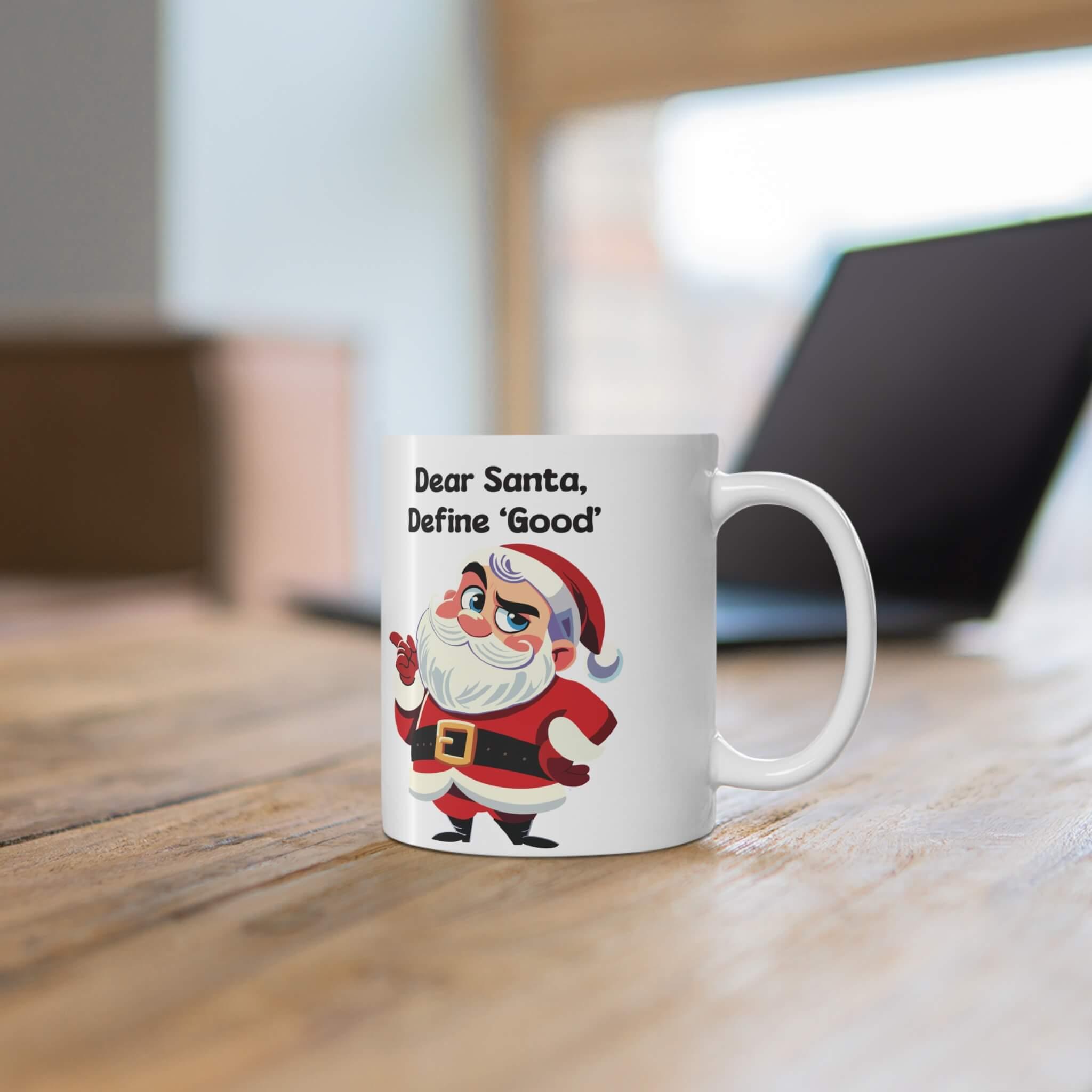 Funny Christmas mug featuring a cheeky Santa with the phrase 'Dear Santa, Define Good,' perfect for holiday coffee or hot chocolate. Available in 11oz and 15oz sizes, ideal for adding a humorous twist to Christmas decor.
