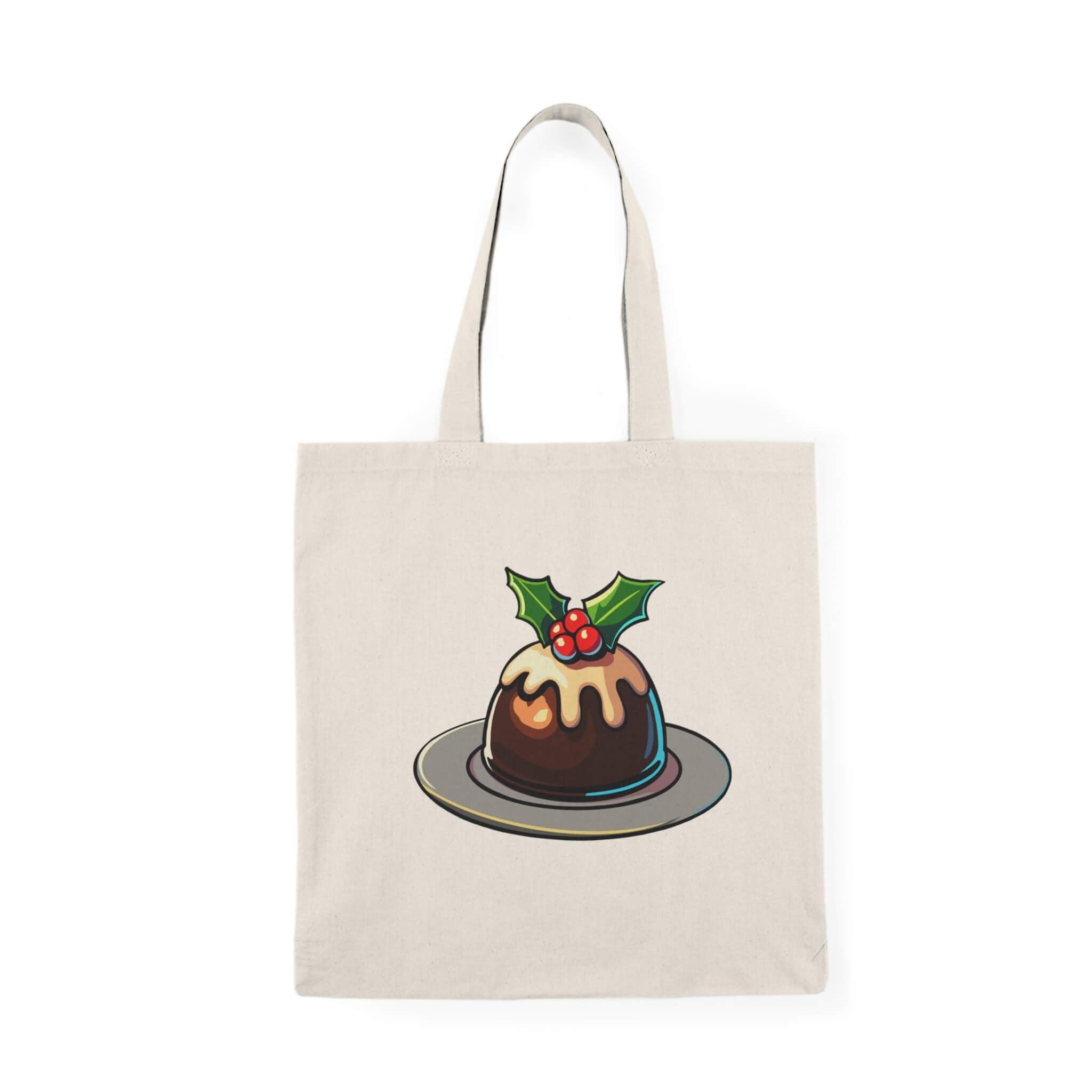 Festive Christmas pudding tote bag featuring a traditional pudding with holly and icing. Made from 100% recycled cotton, perfect for holiday shopping, gift-carrying, and adding seasonal charm to daily errands
