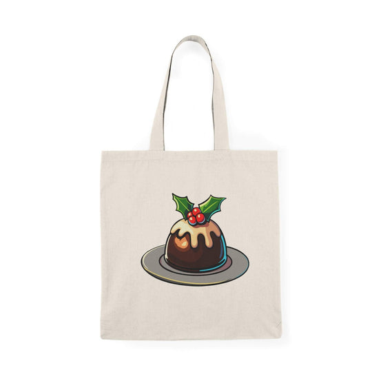 Festive Christmas pudding tote bag featuring a traditional pudding with holly and icing. Made from 100% recycled cotton, perfect for holiday shopping, gift-carrying, and adding seasonal charm to daily errands