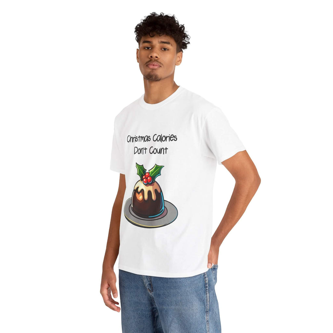 Humorous 'Christmas Calories Don't Count' T-shirt featuring a festive pudding design, made from 100% cotton, perfect for spreading holiday cheer. Available in sizes S to XXL