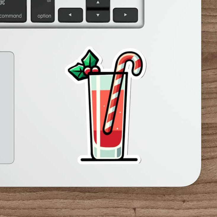 Festive Christmas cocktail sticker with holiday drink, candy cane stirrer, and holly garnish, perfect for laptops and water bottles
