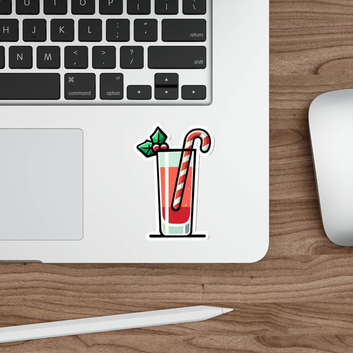 Festive Christmas cocktail sticker with holiday drink, candy cane stirrer, and holly garnish, perfect for laptops and water bottles