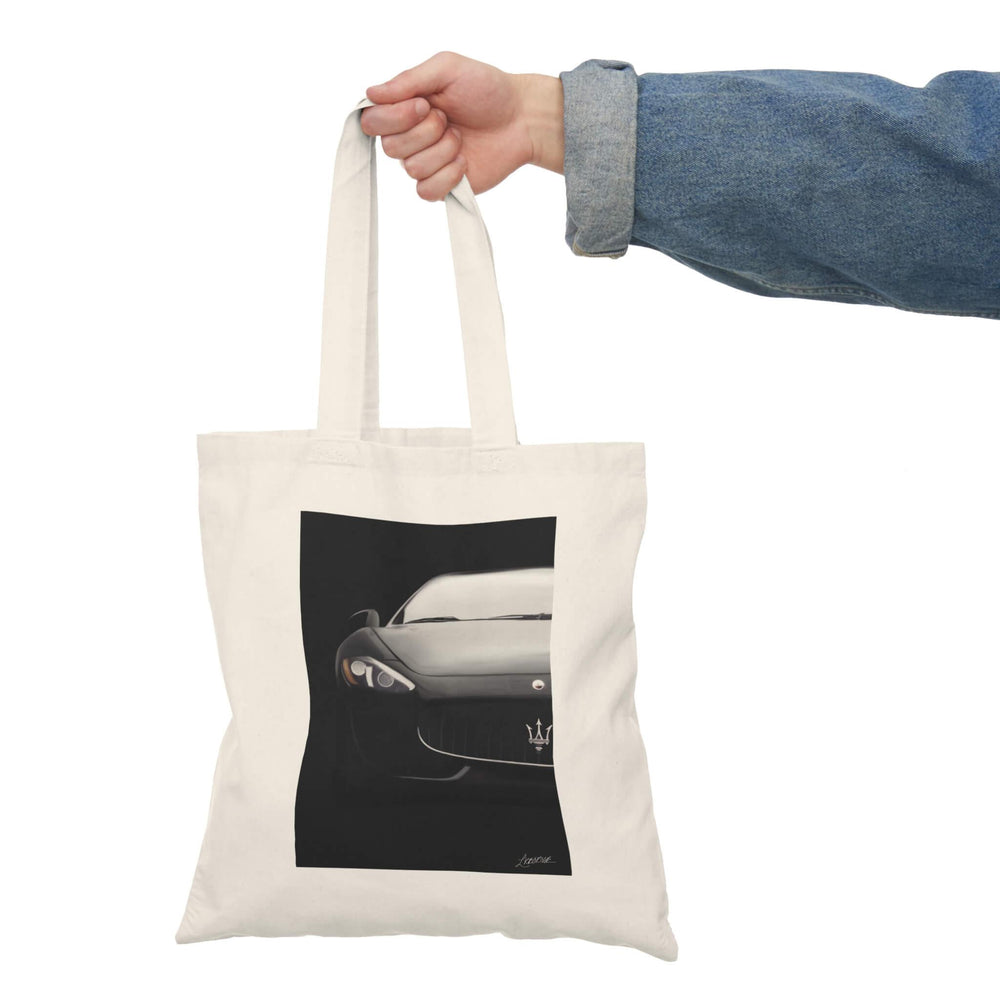 Stylish tote bag featuring a sleek, minimalist illustration of a vintage sports car on a black background, perfect for automotive enthusiasts