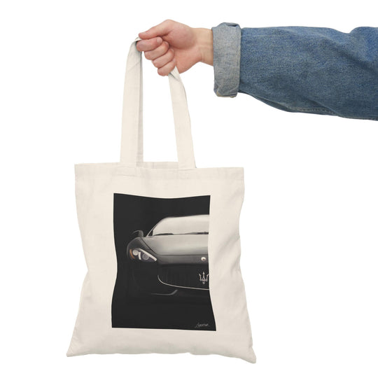 Stylish tote bag featuring a sleek, minimalist illustration of a vintage sports car on a black background, perfect for automotive enthusiasts