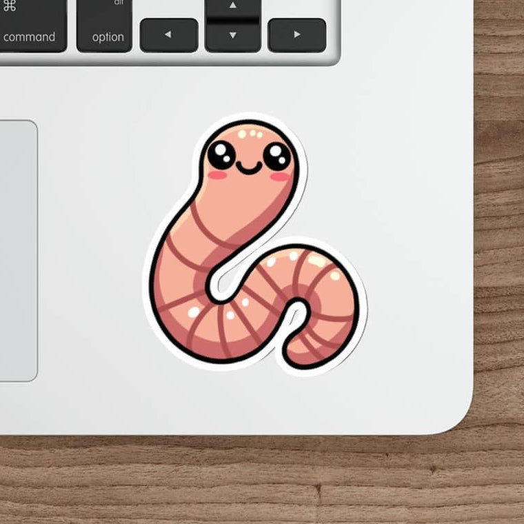 Cute pink worm sticker on a laptop keyboard, available as a single, in a three-pack, or six-pack, waterproof and durable for everyday use.