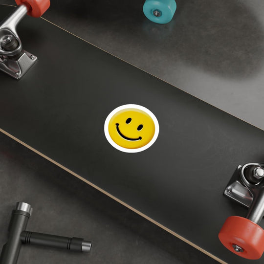 Waterproof and durable smiling face sticker on a laptop keyboard, adding a touch of cheer to everyday tech accessories.