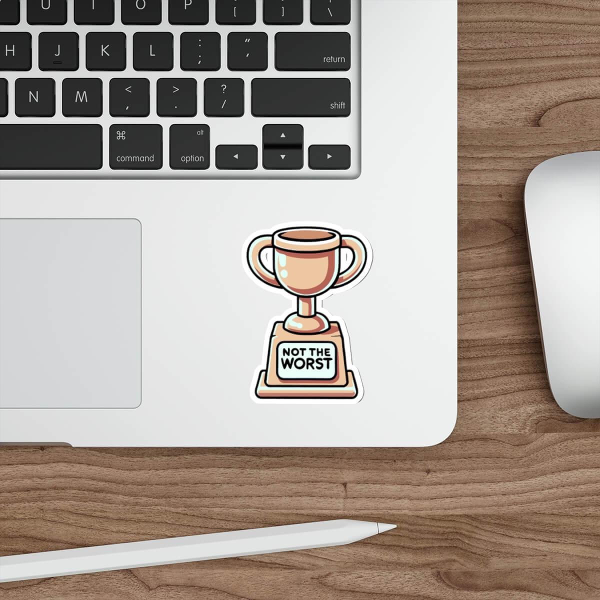 Durable and waterproof sticker featuring a trophy with the inscription 'Not the Worst', perfect for laptops and other surfaces.