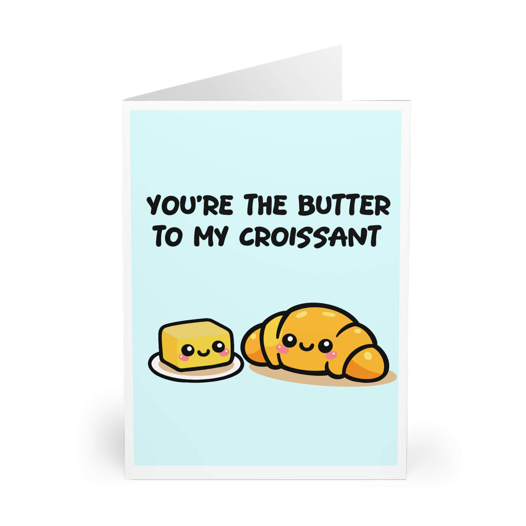 Cute illustrated greeting card showing butter and croissant characters with the text ‘You’re the butter to my croissant’