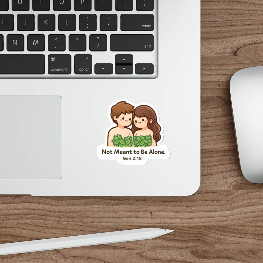 Cute Adam and Eve sticker with leaves and the text “Not Meant to Be Alone Gen 2:18” in kawaii style vinyl decal on a laptop.