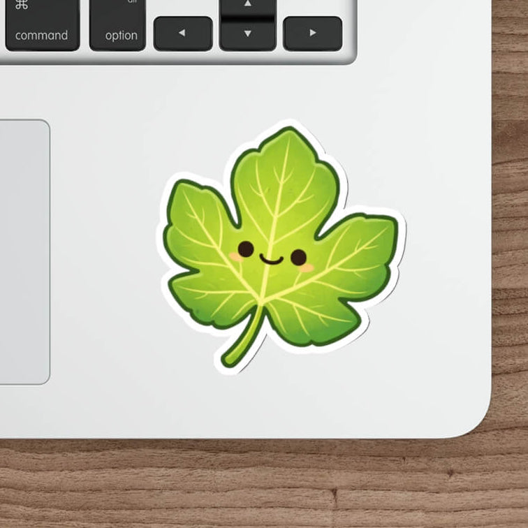 Cute green fig leaf sticker with a smiling face in kawaii style vinyl decal inspired by Genesis.