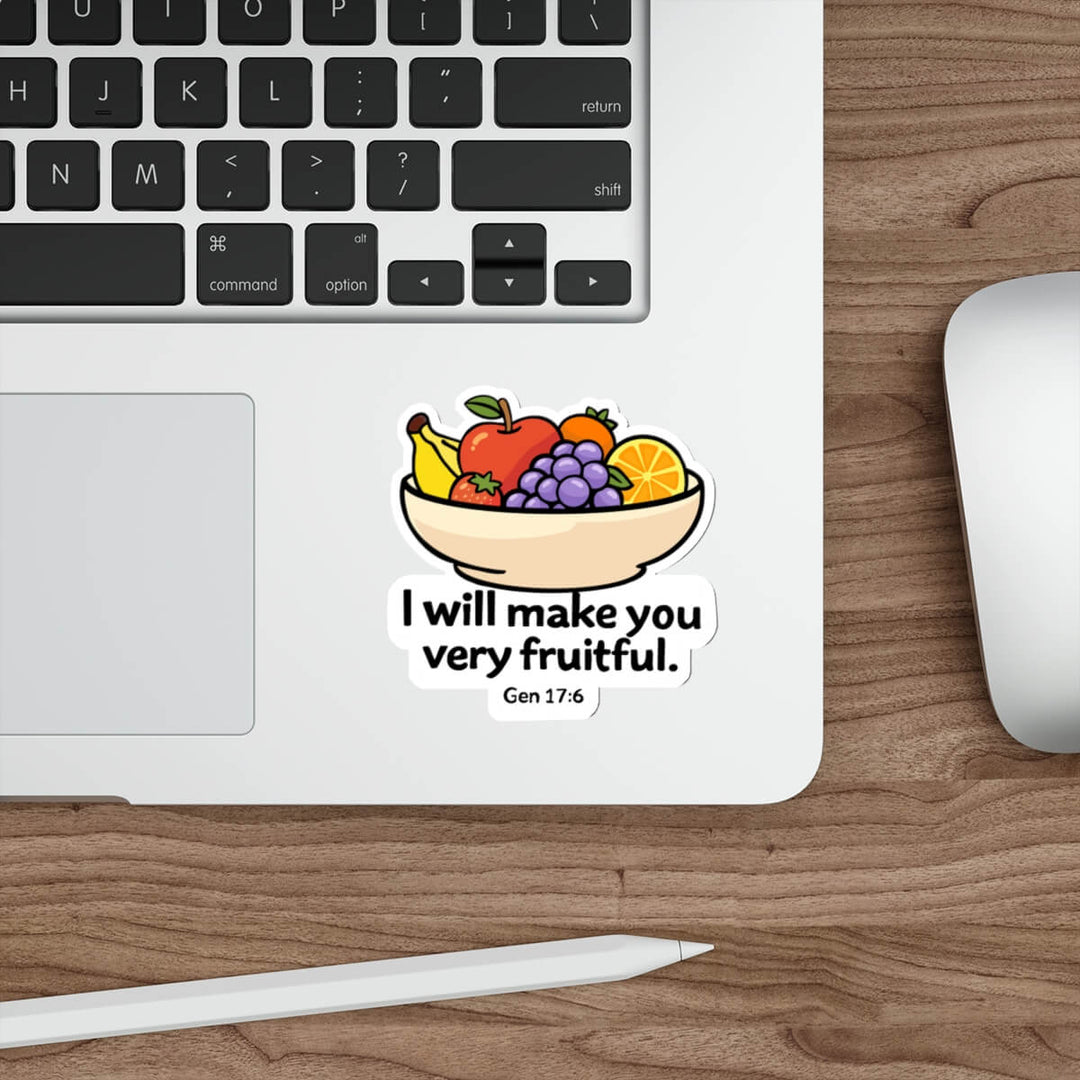 Cute fruit bowl sticker with grapes, apple, banana and orange and the text “I will make you very fruitful Gen 17:6” in kawaii style vinyl decal.