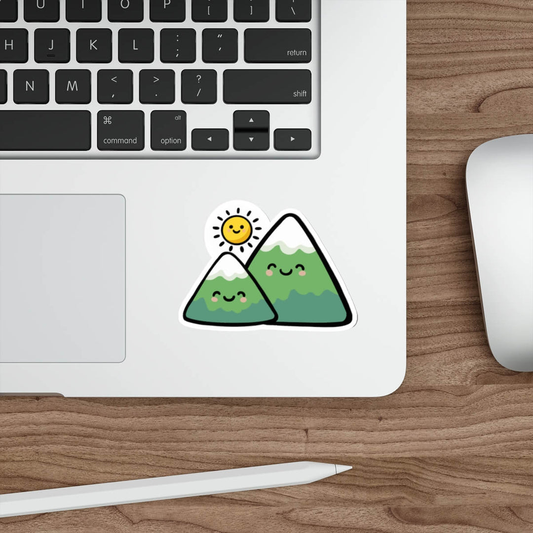Cute mountain sticker with smiling peaks and sun in kawaii minimalist style
