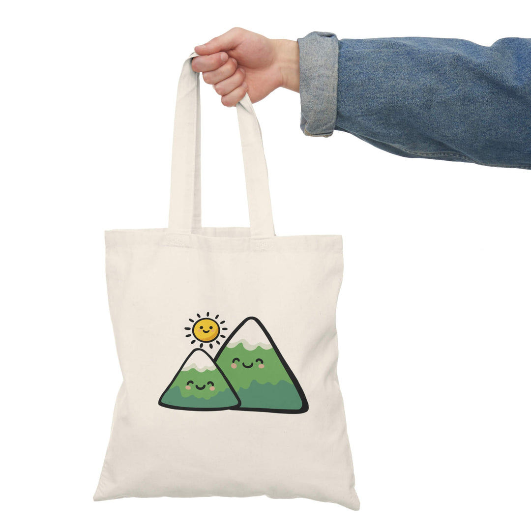 Cute mountain tote bag with kawaii hills and sun illustration