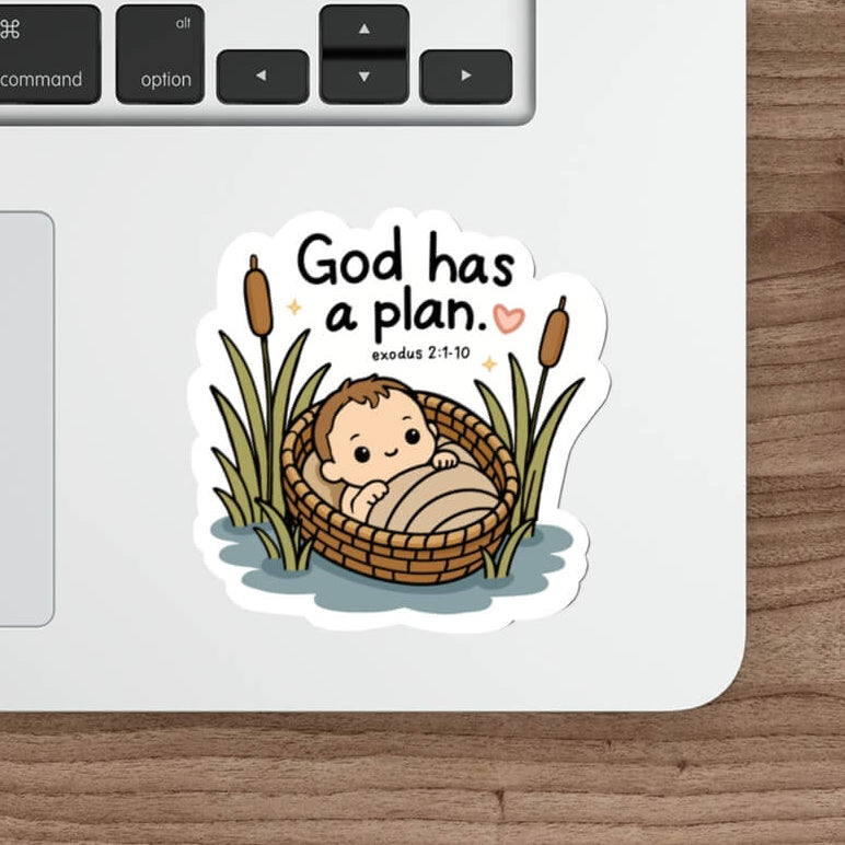 Cute Exodus 2 Christian sticker featuring baby Moses in a basket among the reeds with the words God Has A Plan.