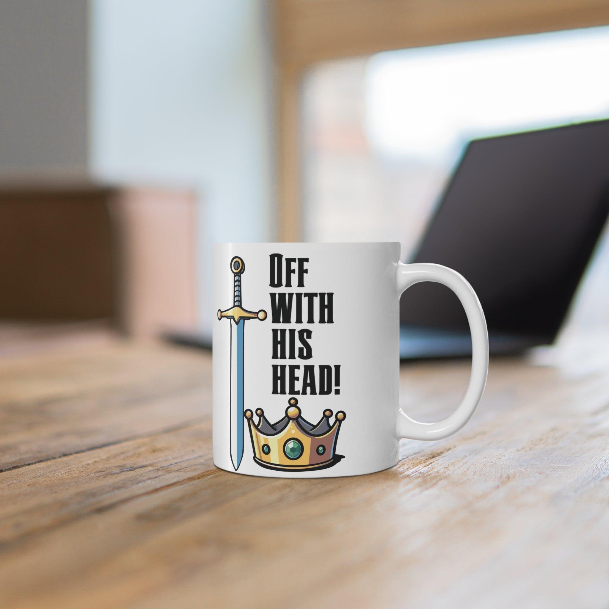 White ceramic mug with a medieval-style illustration of a crown and sword, accompanied by the text 'Off with His Head,' ideal for fans of historical or fantasy themes