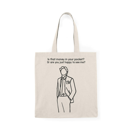 A natural canvas tote bag displaying an illustration of a man in a suit with the text 'Is that money in your pocket?'. The design is both stylish and cheeky, appealing to those who appreciate clever humor in their accessories.