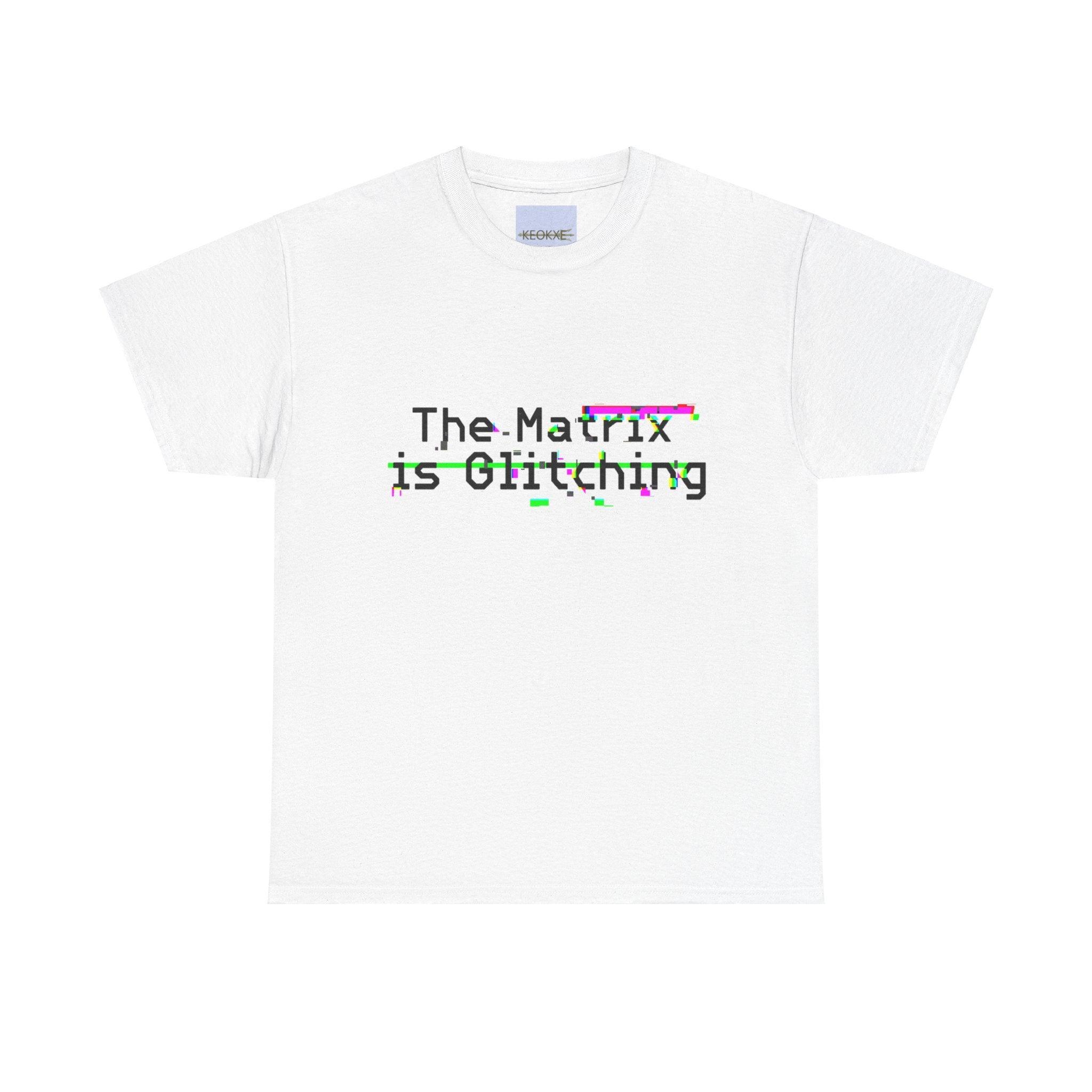 White T-shirt with a glitch-style design of the text 'The Matrix Is Glitching.' A modern, tech-inspired design for those who enjoy the sci-fi world and references to the Matrix.