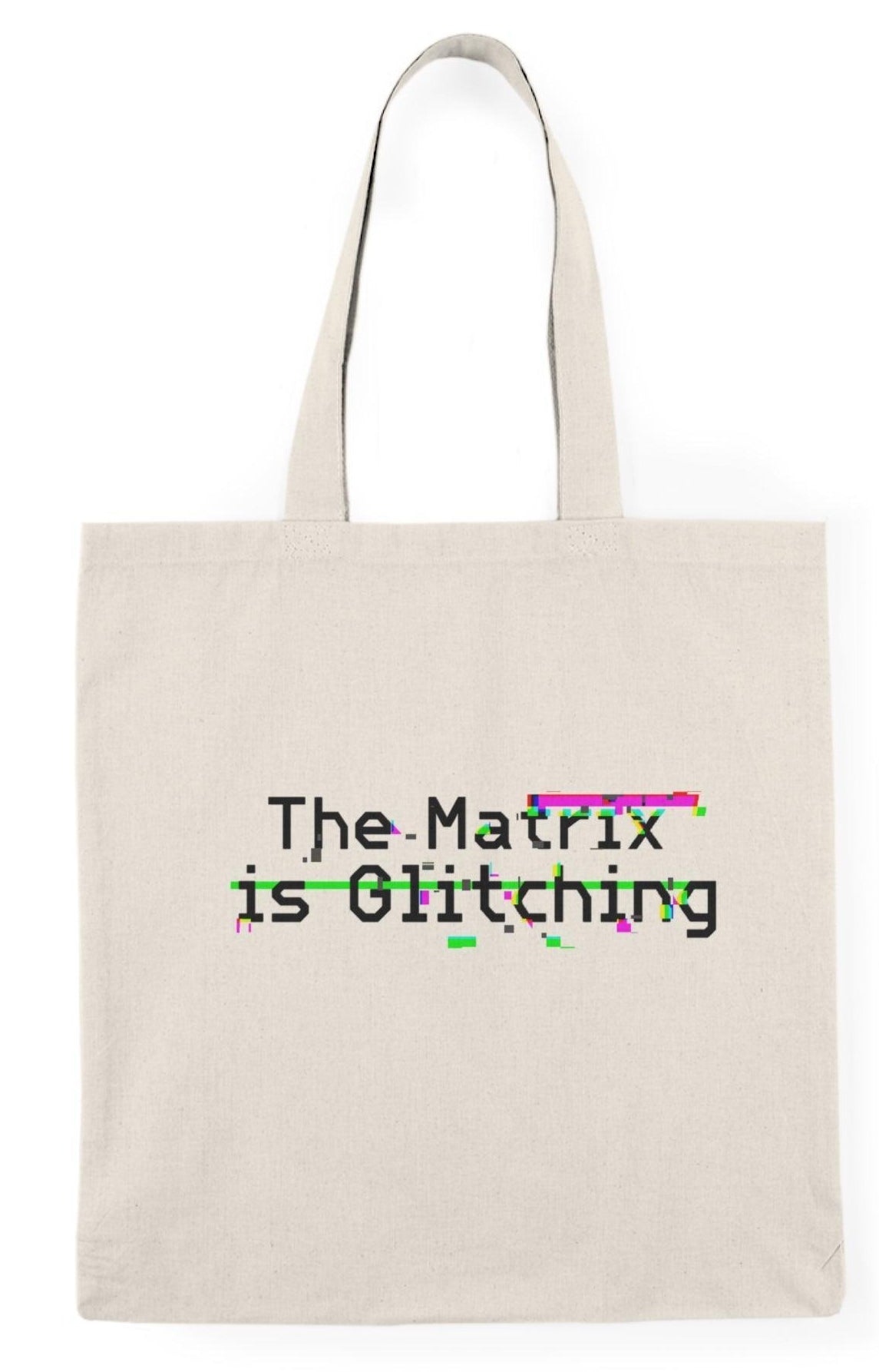 A cream-colored tote bag featuring the phrase 'The Matrix is Glitching' in a dynamic glitch graphic, capturing the essence of digital anomalies. The design uses an array of weird colors to embody the unsettling yet fascinating concept of reality distortion. The tote measures 40 x 38 cm (15.7 x 15 inches) and is made from 100% recycled cotton, providing an eco-friendly choice without sacrificing durability or style.  KEOLIX
