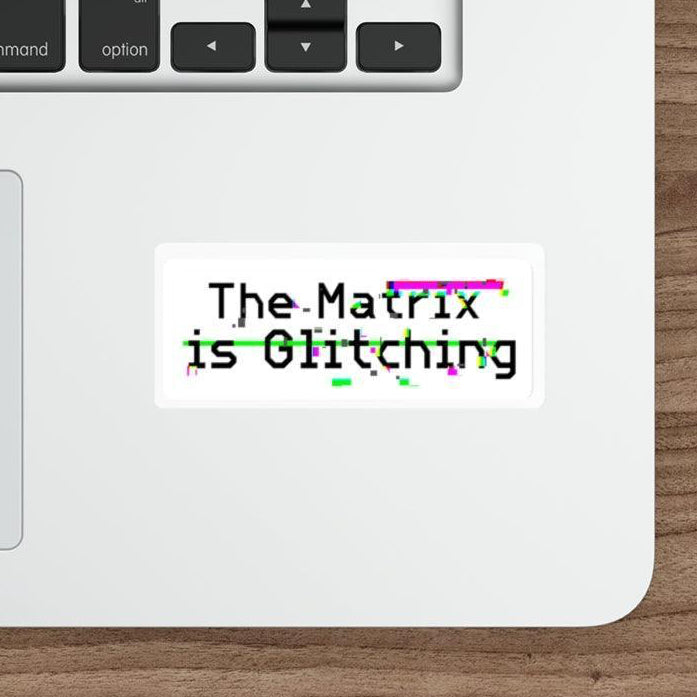 The Matrix is Glitching Waterproof Sticker: A bold text sticker referencing 'The Matrix is Glitching,' ideal for tech enthusiasts or fans of sci-fi. Adds a touch of mystery to any surface. KEOLIX 
