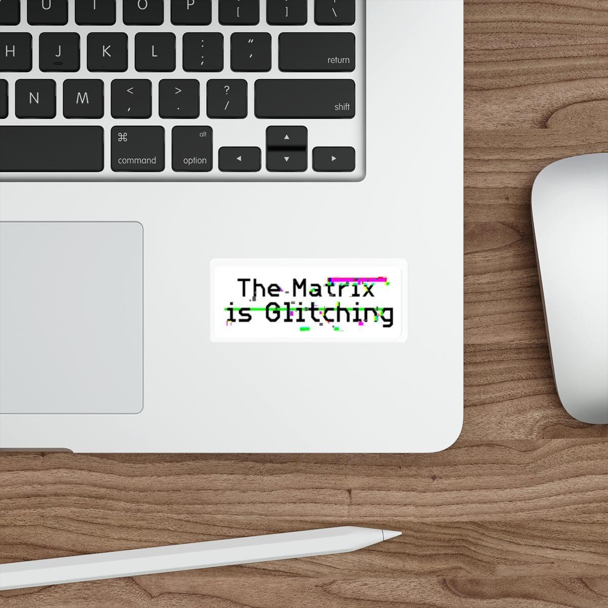 The Matrix is Glitching Waterproof Sticker: A bold text sticker referencing 'The Matrix is Glitching,' ideal for tech enthusiasts or fans of sci-fi. Adds a touch of mystery to any surface. KEOLIX 
