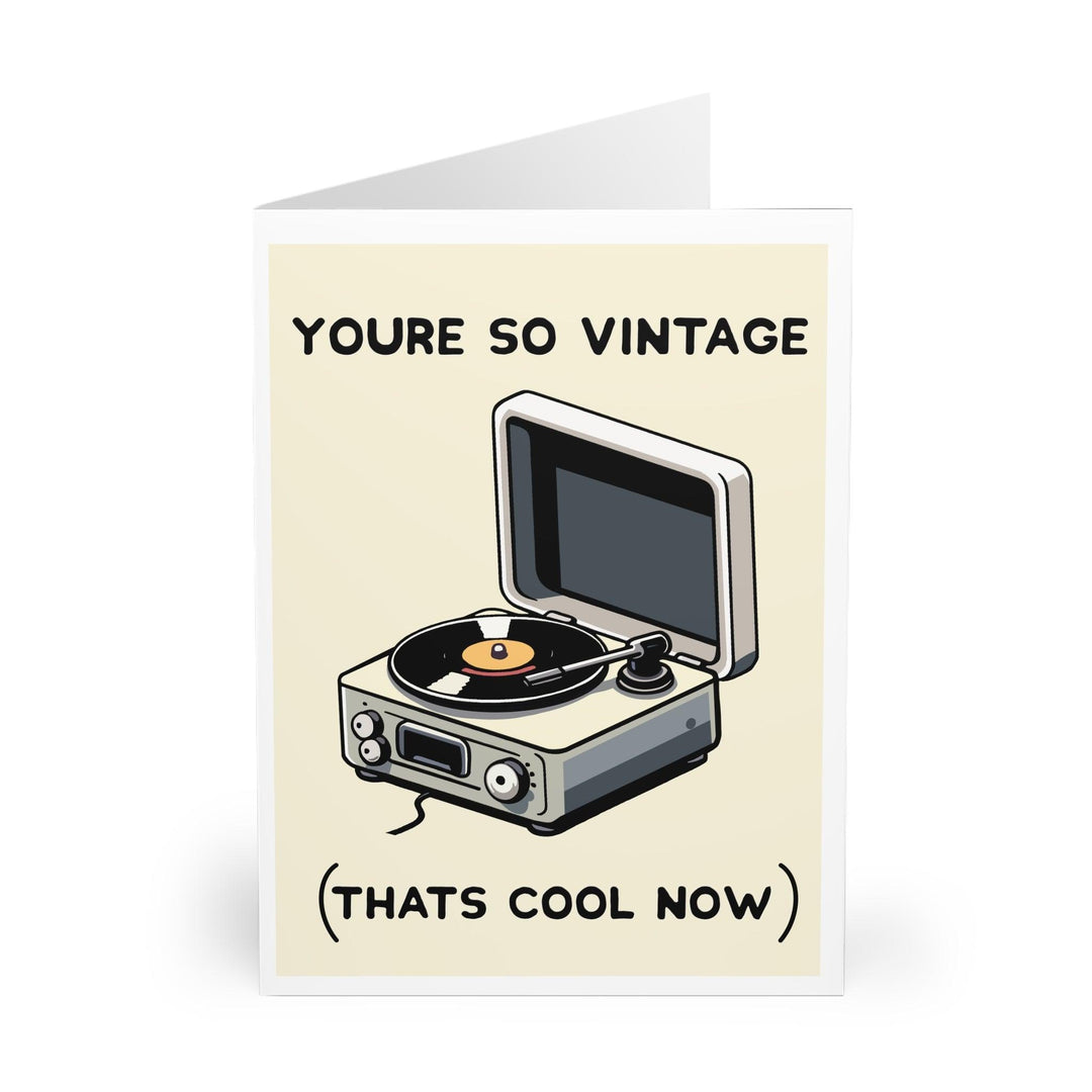 A retro-themed card featuring a vintage record player illustration and the phrase 'You’re So Vintage (That’s Cool Now).' Perfect for someone who loves nostalgia - Baby Keo.