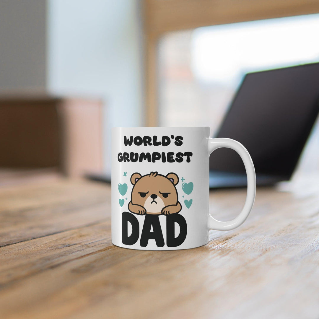 'World's Grumpiest Dad' Mug - "White ceramic mug with a cartoon dad and the phrase 'World's Grumpiest Dad,' ideal for a playful Father's Day gift."
