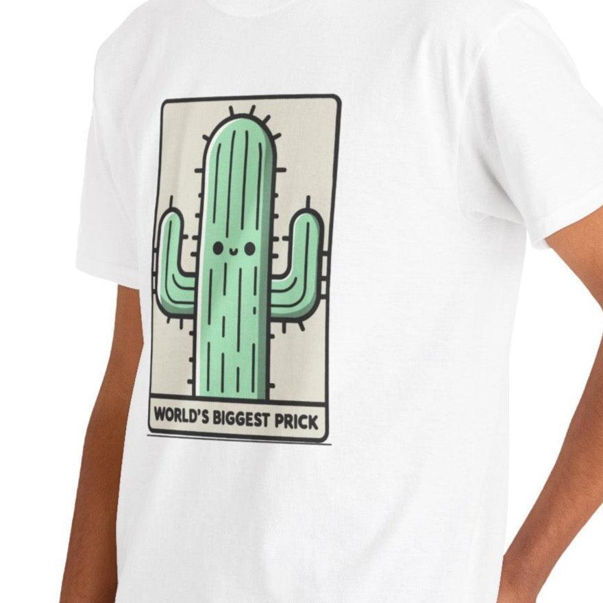 White T-shirt featuring a large cartoon cactus and the phrase 'World's Biggest Prick.' A humorous and cheeky design for those who enjoy a little tongue-in-cheek humor