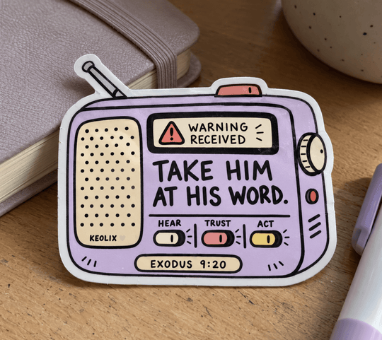 A die-cut sticker shaped like a retro radio, featuring the text &