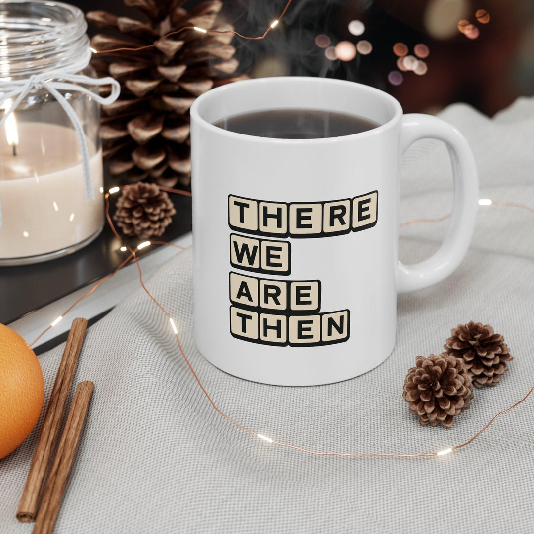 White ceramic mug with bold text 'There We Are Then TWAT,' offering a humorous and edgy design for your coffee break