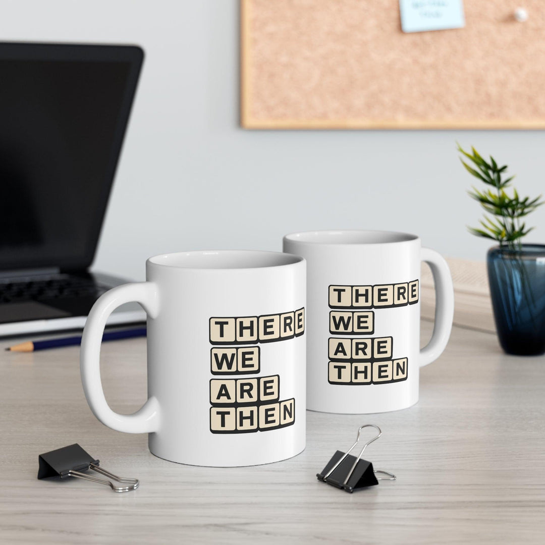 White ceramic mug with bold text 'There We Are Then TWAT,' offering a humorous and edgy design for your coffee break