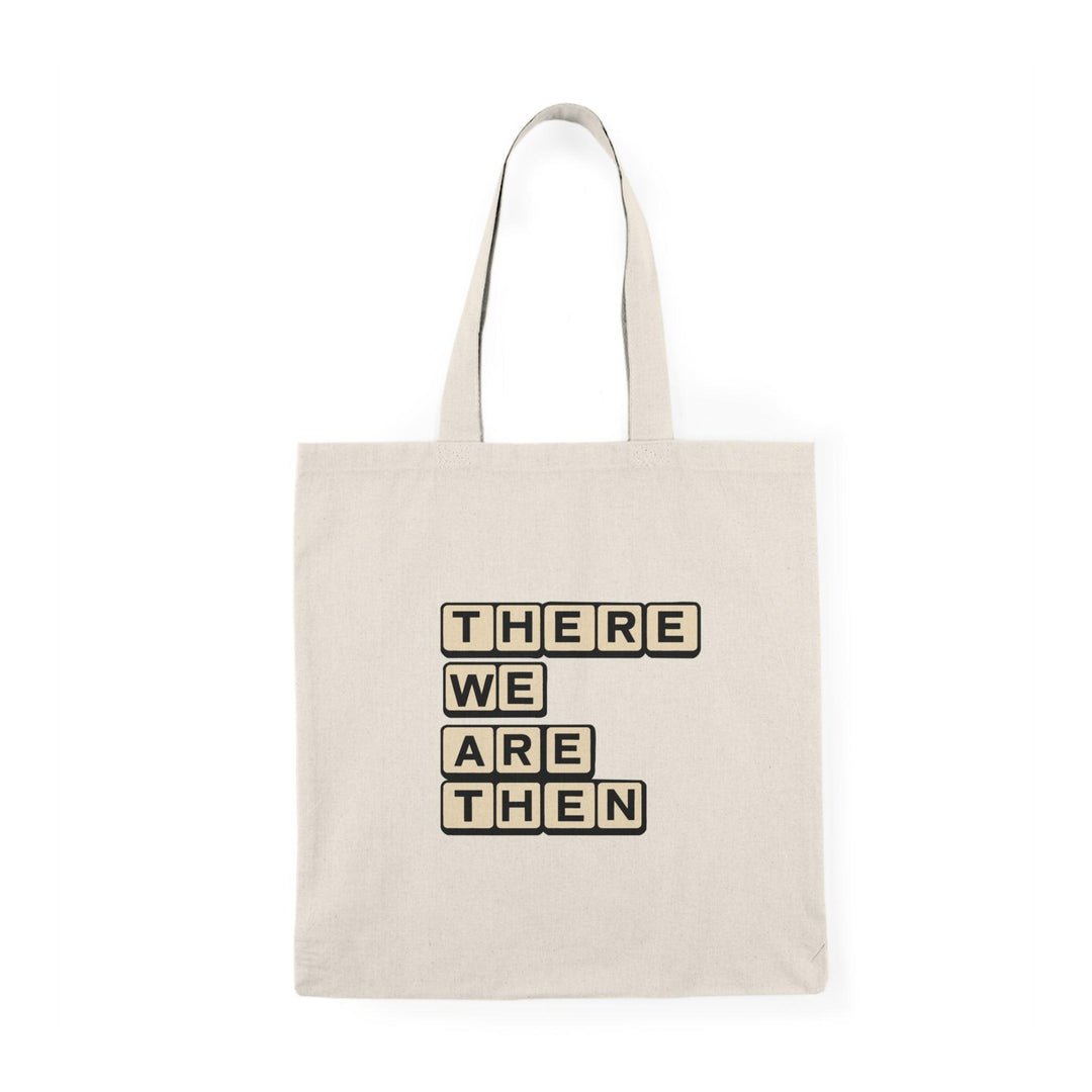 A natural canvas tote bag showcasing the phrase 'There we are then TWAT' in bold, playful typography. This humorous design adds a touch of sarcasm, making it a great accessory for those with a cheeky sense of humor