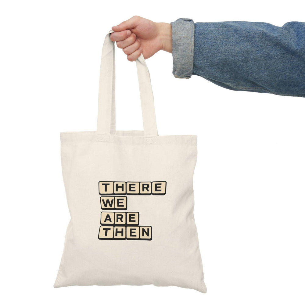 A natural canvas tote bag showcasing the phrase 'There we are then TWAT' in bold, playful typography. This humorous design adds a touch of sarcasm, making it a great accessory for those with a cheeky sense of humor