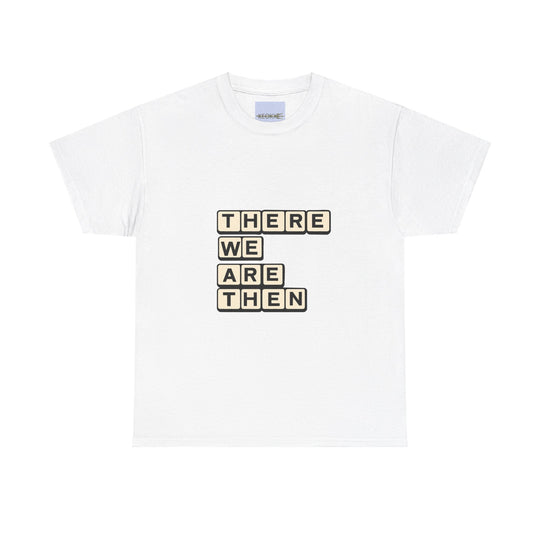 White T-shirt featuring a stylized text block with the phrase 'There We Are Then Twat.' A bold and humorous design for those who enjoy British humor and cheeky phrases."

