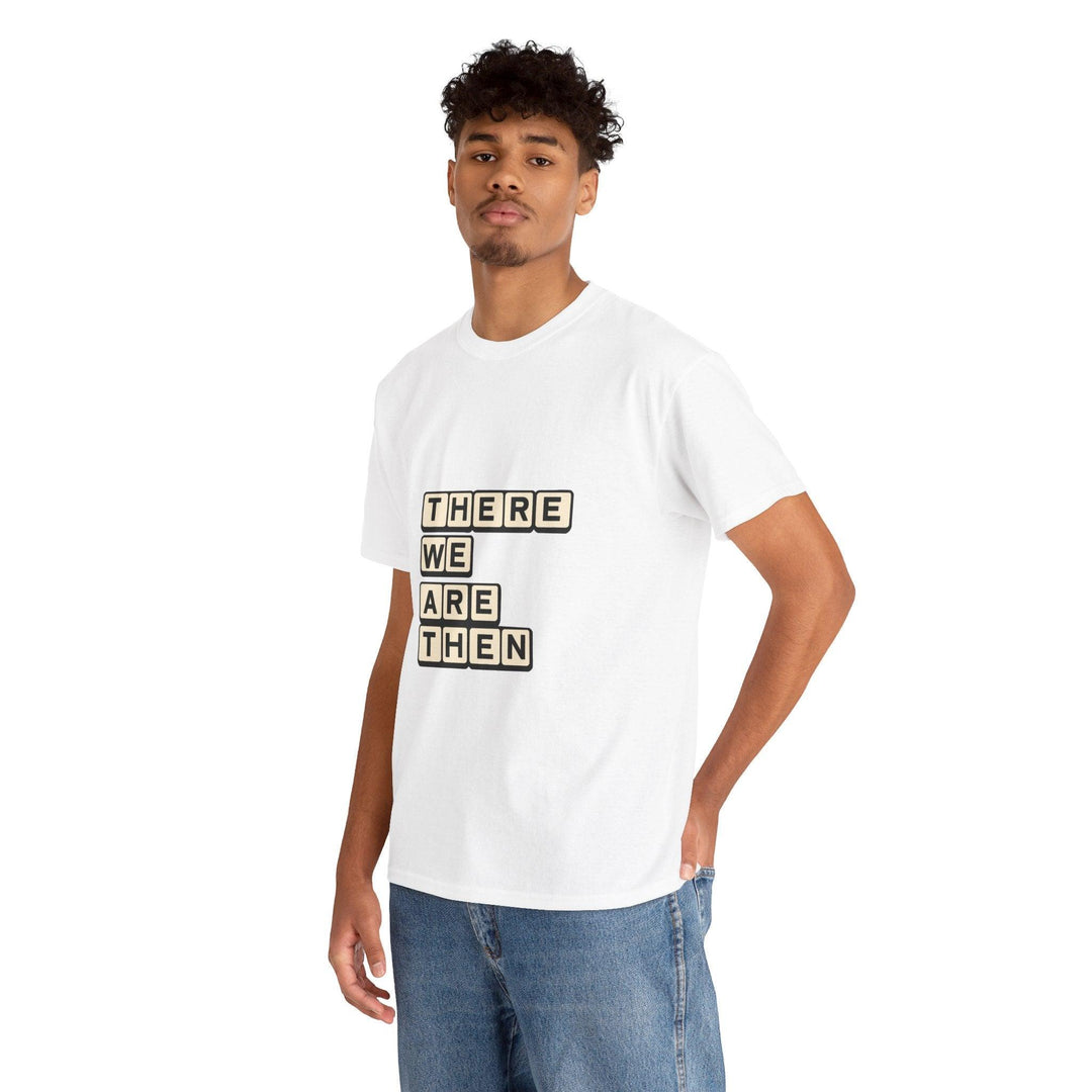 White T-shirt featuring a stylized text block with the phrase 'There We Are Then Twat.' A bold and humorous design for those who enjoy British humor and cheeky phrases."

