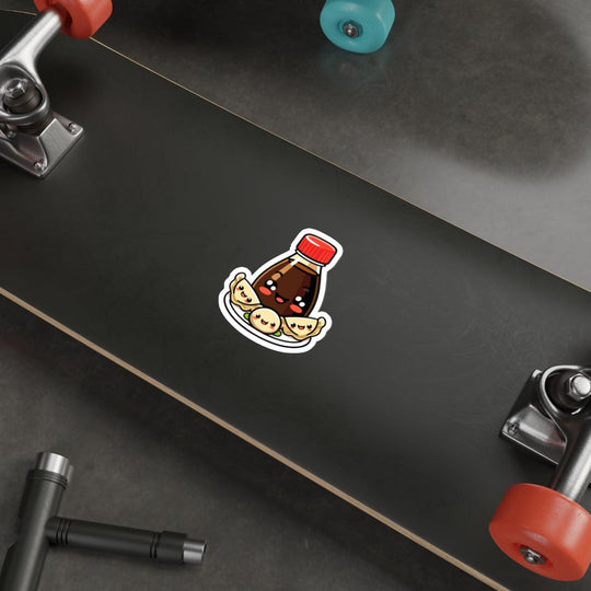 Soy Sauce with Gyozas Waterproof Sticker: A cute soy sauce bottle paired with dumplings (gyozas), perfect for foodies and those who love adorable food-themed designs. KEOLIX 