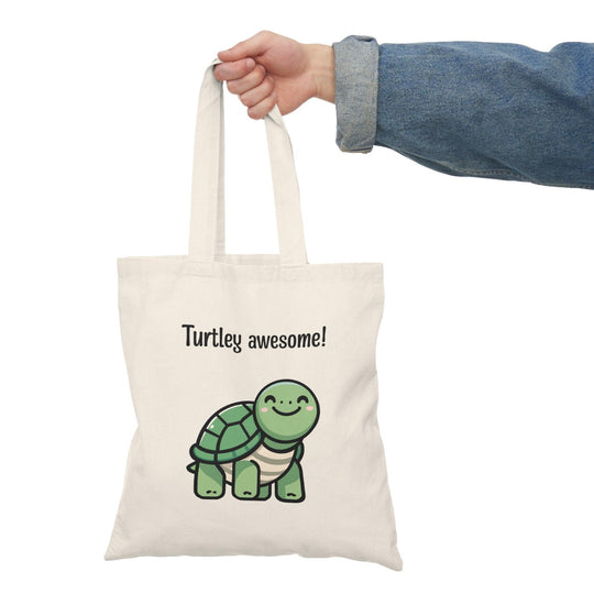 Eco-friendly canvas tote bag featuring a cute turtle illustration with the phrase 'Turtley awesome!' Perfect for animal lovers and sustainable shopping - Baby Keo.