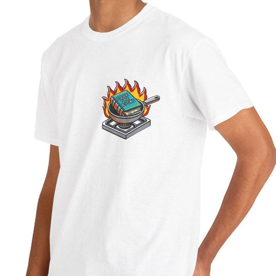 White T-shirt with an illustration of a burning book on a stove, humorously conveying the phrase 'Cook the Books.' A clever and cheeky design for book lovers and accountants alike.