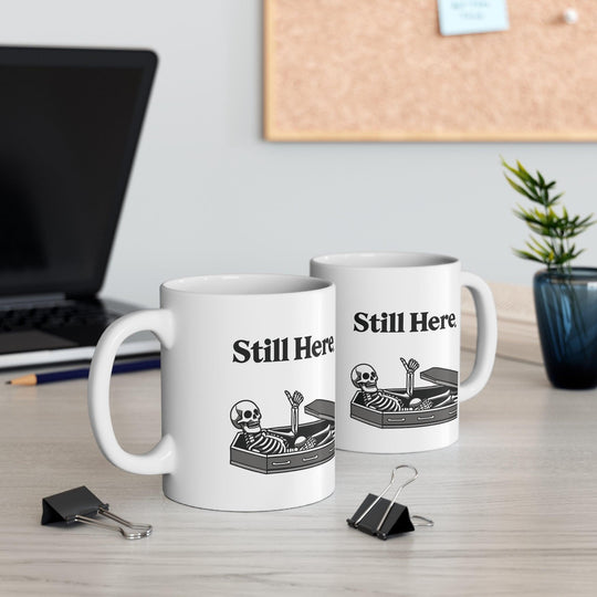 Minimalistic white ceramic mug with the text &